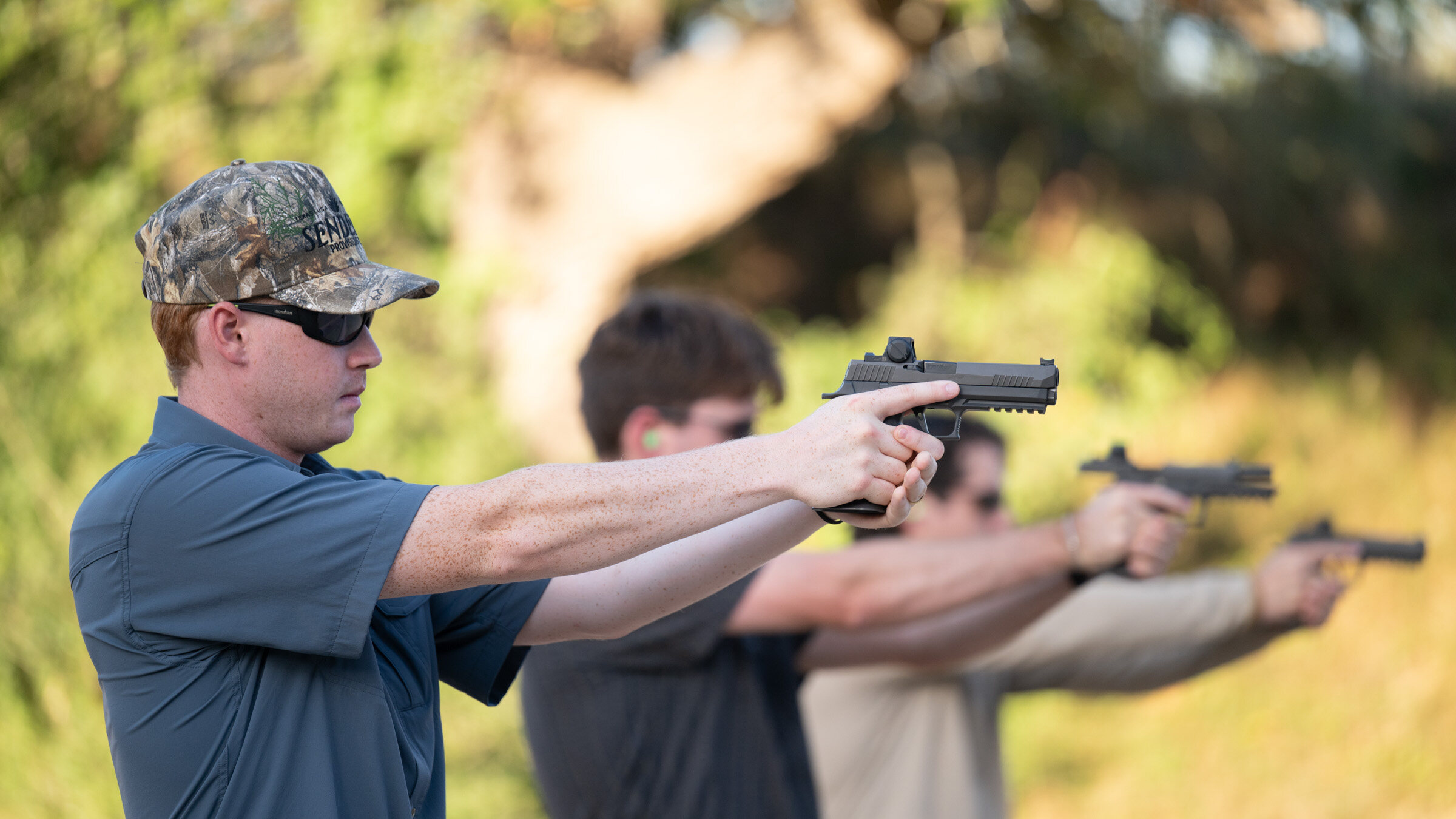 A pistol line under instruction at Hog Heaven