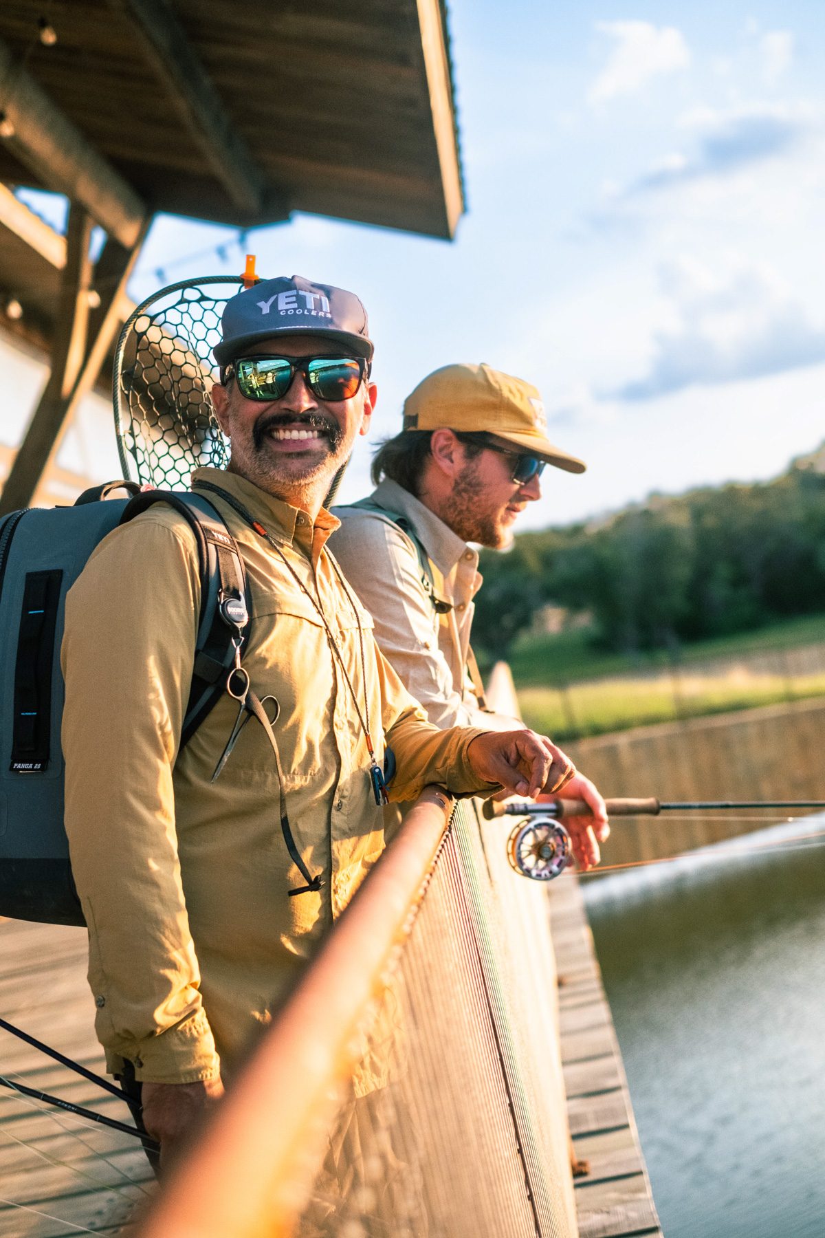 Members fly fishing on the dock at Hog Heaven